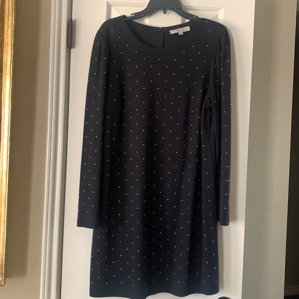 Black medium weight dress with gold embellishments.  Fun and comfy to wear.